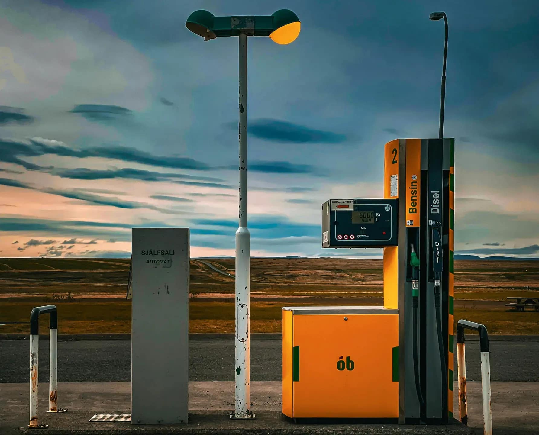 ÓB self-service gas station in Iceland with petrol and diesel pumps showing Iceland’s unique pump colors for travelers
