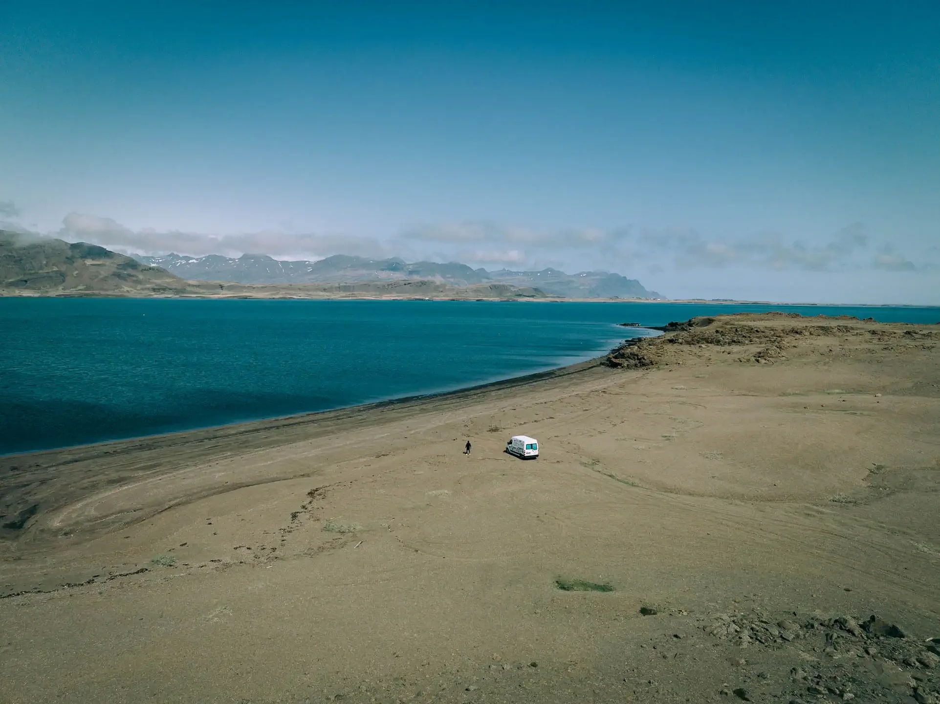 campervan parked on remote beach during an Iceland campervan road trip along the Ring Road coastline