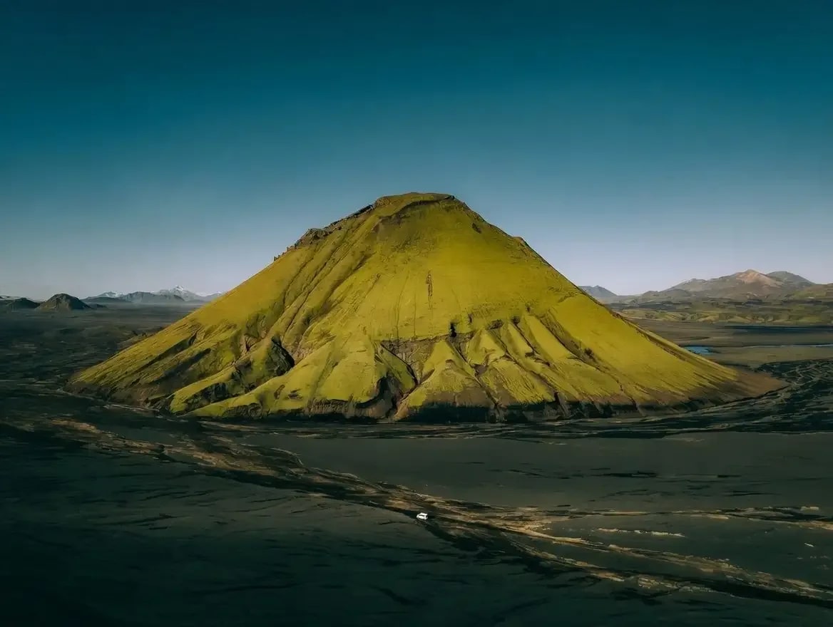 Campervan exploring Iceland’s volcanic landscape during a road trip planned with a reliable campervan rental