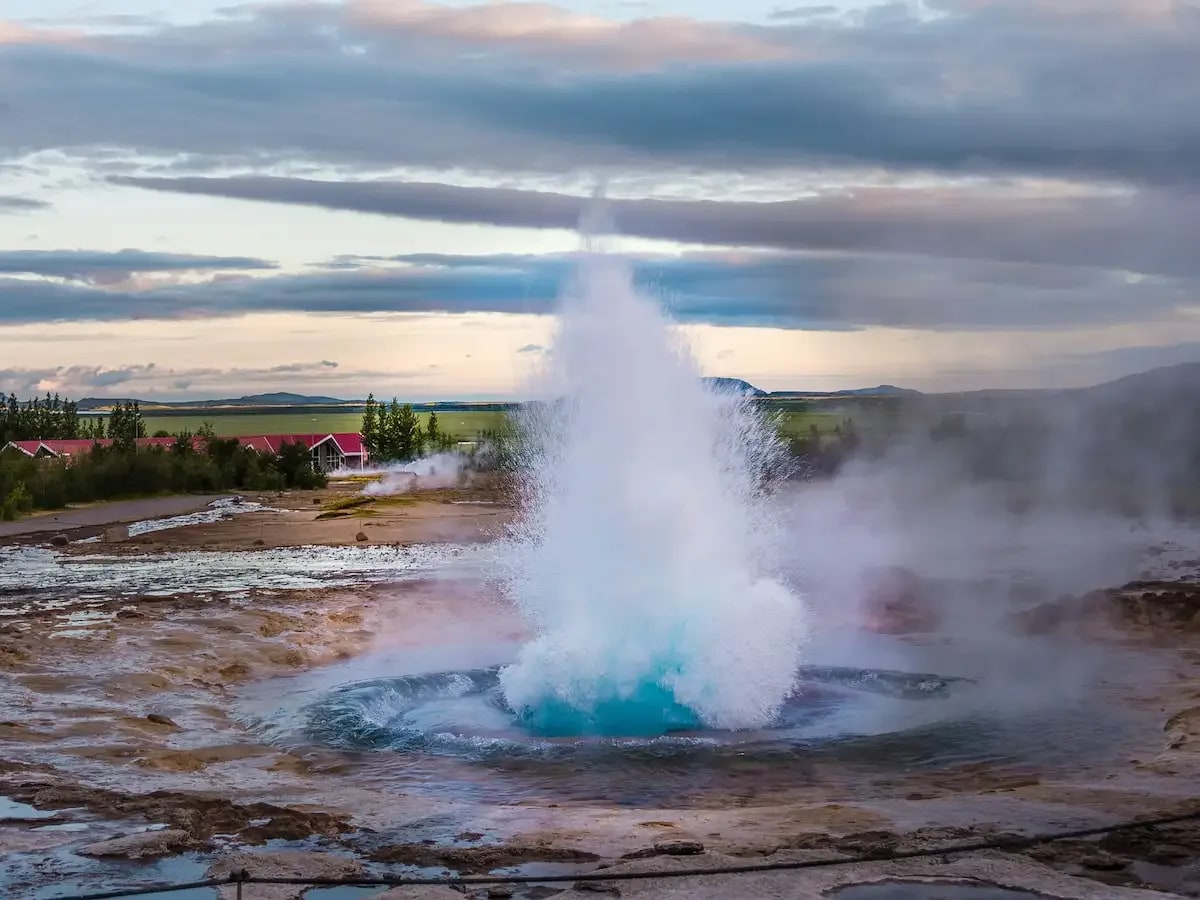 Strokkur geyser erupting in the Geysir geothermal area on the Golden Circle route in Iceland